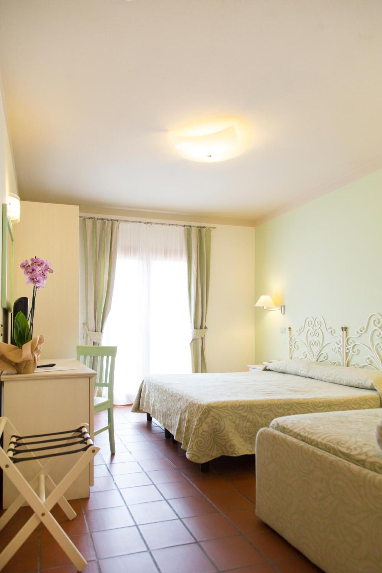 Blu Hotel Laconia Village Cannigione Camera foto
