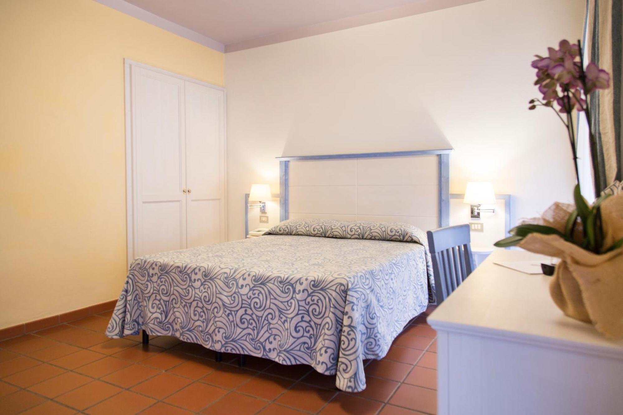 Blu Hotel Laconia Village Cannigione Camera foto