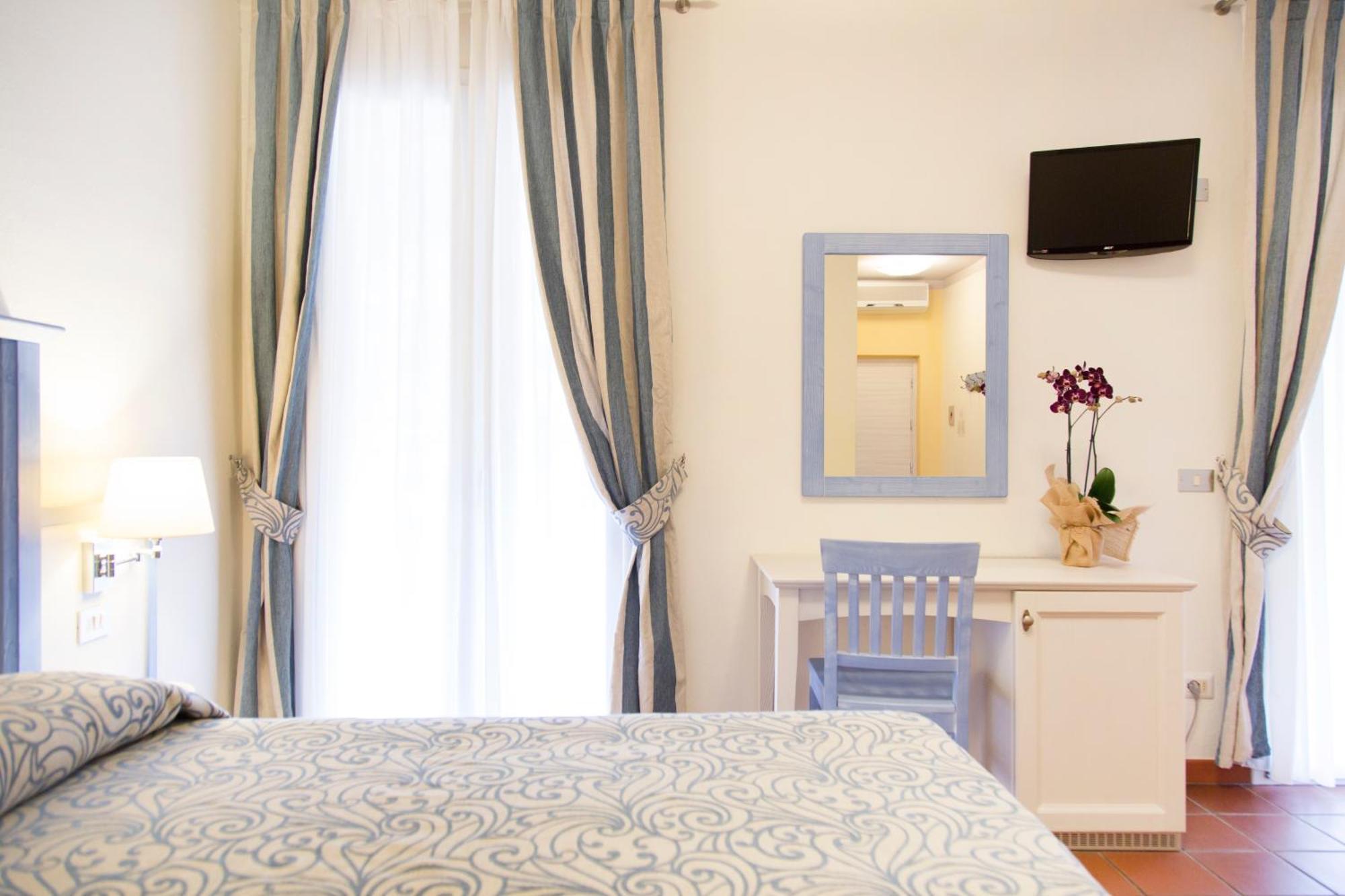 Blu Hotel Laconia Village Cannigione Camera foto